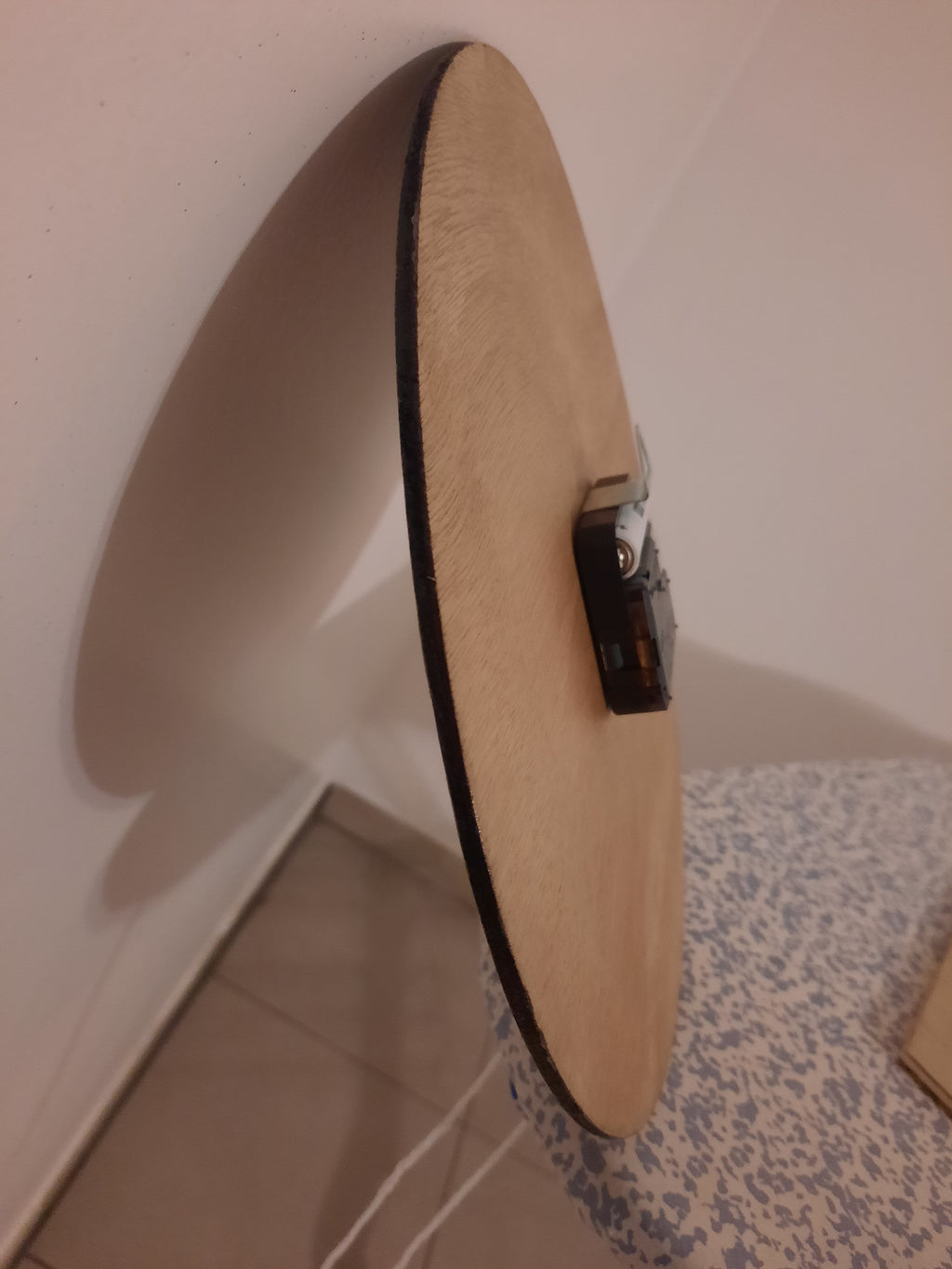 Pendule en bois pentanque