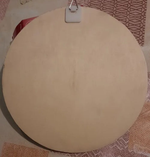 Cadre en bois rond motif paon
